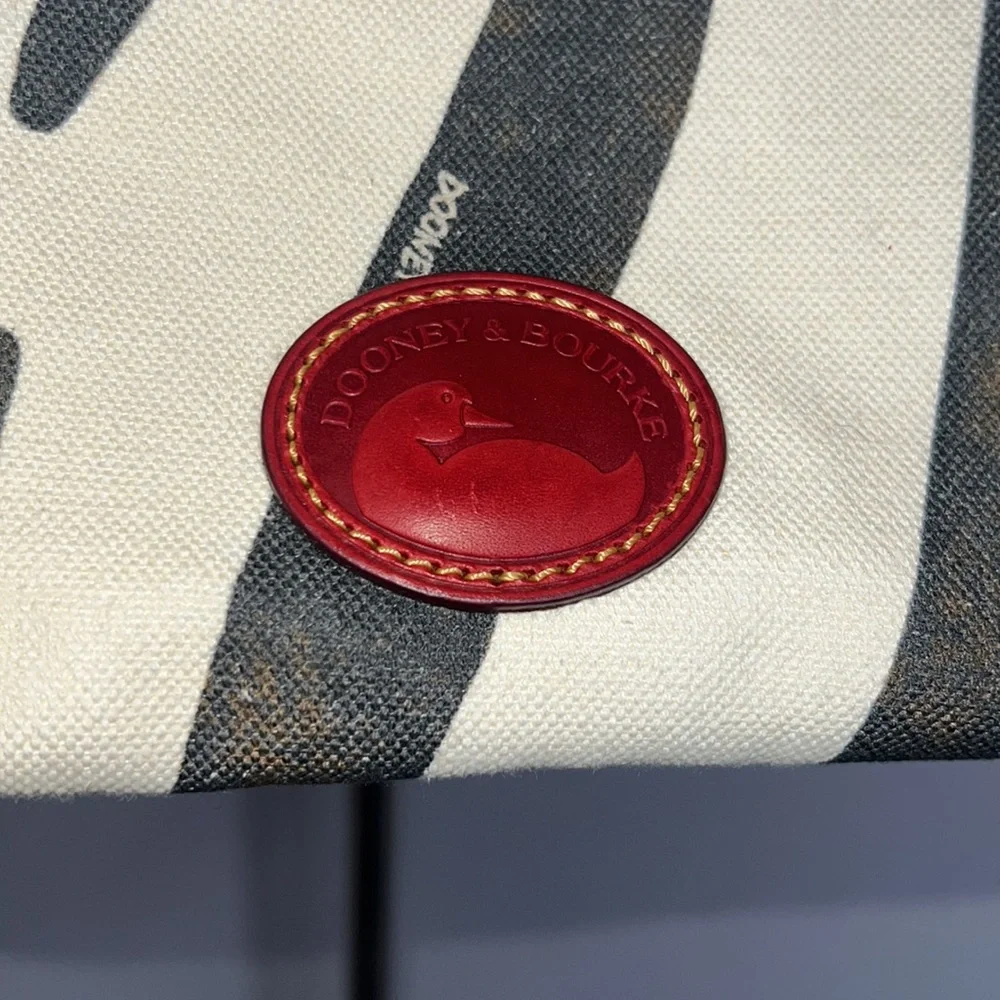 Dooney & Bourke Zebra Print Tote with Red Accents
In pristine condition. - Picture 3 of 8